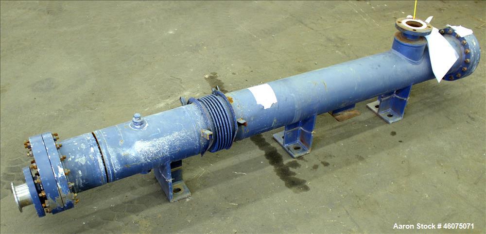 Used ITT Industries Shell & Tube Heat Exchanger, Approximate 124 Square Feet, Horizontal. Carbon steel shell rated 100 psi at -20 to 375 degrees F. (200) 3/8" Diameter x approximate 78" long 316 Stai...