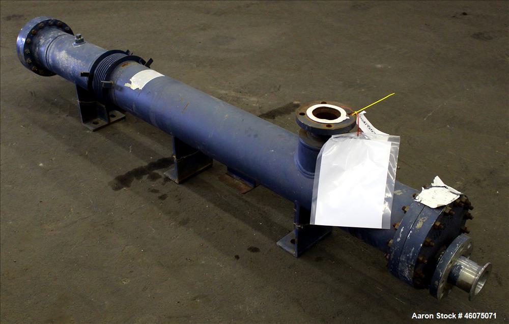 Used ITT Industries Shell & Tube Heat Exchanger, Approximate 124 Square Feet, Horizontal. Carbon steel shell rated 100 psi at -20 to 375 degrees F. (200) 3/8" Diameter x approximate 78" long 316 Stai...