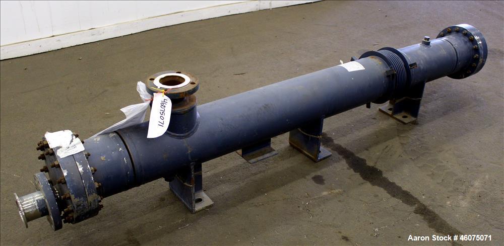 Used ITT Industries Shell & Tube Heat Exchanger, Approximate 124 Square Feet, Horizontal. Carbon steel shell rated 100 psi at -20 to 375 degrees F. (200) 3/8" Diameter x approximate 78" long 316 Stai...