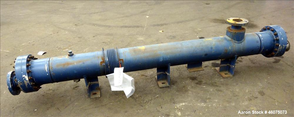 Used ITT Industries Shell & Tube Heat Exchanger, Approximate 124 Square Feet, Horizontal. Carbon steel shell rated 100 psi at -20 to 375 degrees F. (200) 3/8" Diameter x approximate 78" long 316 Stai...