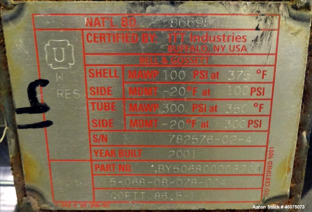 Used ITT Industries Shell & Tube Heat Exchanger, Approximate 124 Square Feet, Horizontal. Carbon steel shell rated 100 psi at -20 to 375 degrees F. (200) 3/8" Diameter x approximate 78" long 316 Stai...
