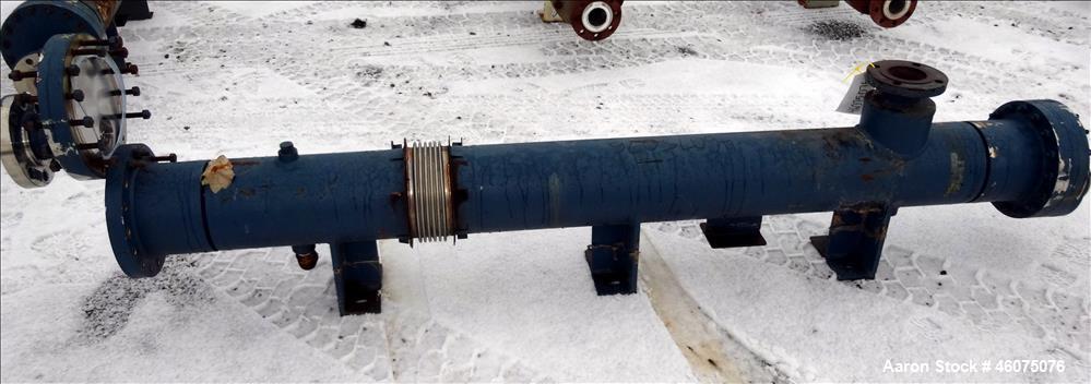 Used ITT Industries Shell & Tube Heat Exchanger, Approximate 124 Square Feet, Horizontal. Carbon steel shell rated 100 psi at -20 to 375 degrees F. (200) 3/8" Diameter x approximate 78" long 316L sta...