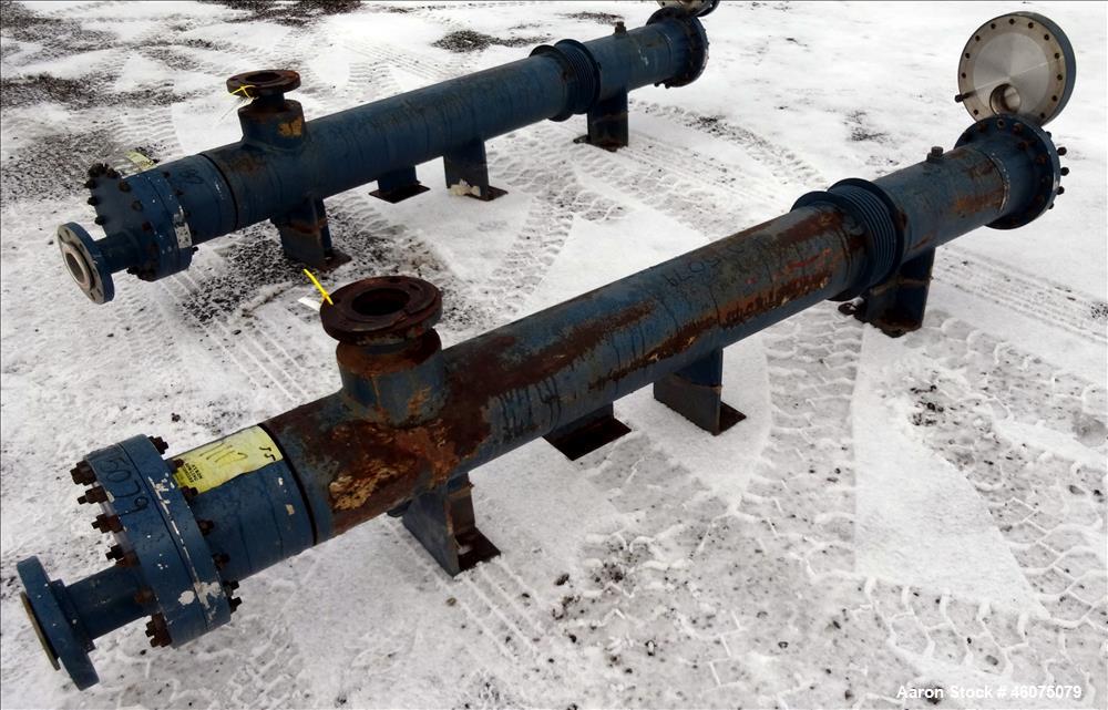 Used ITT Industries Shell & Tube Heat Exchanger, Approximate 124 Square Feet, Horizontal. Carbon steel shell rated 100 psi at -20 to 375 degrees F. (200) 3/8" Diameter x approximate 78" long 316 Stai...