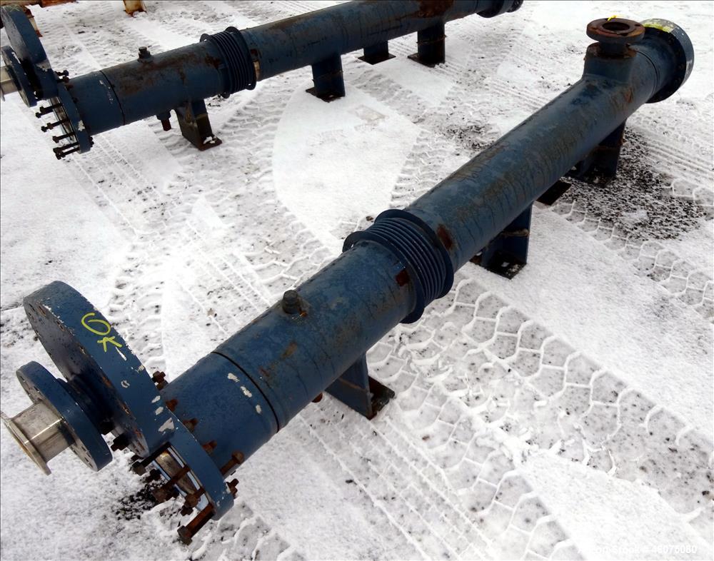Used ITT Industries Shell & Tube Heat Exchanger, Approximate 124 Square Feet, Horizontal. Carbon steel shell rated 100 psi at -20 to 375 degrees F. (200) 3/8" Diameter x approximate 78" long 316 Stai...