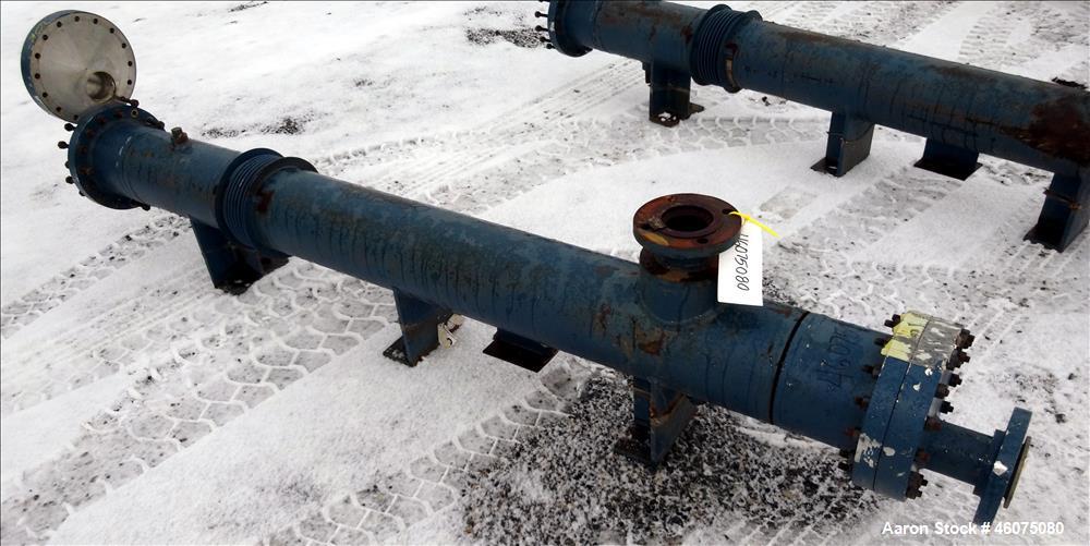 Used ITT Industries Shell & Tube Heat Exchanger, Approximate 124 Square Feet, Horizontal. Carbon steel shell rated 100 psi at -20 to 375 degrees F. (200) 3/8" Diameter x approximate 78" long 316 Stai...