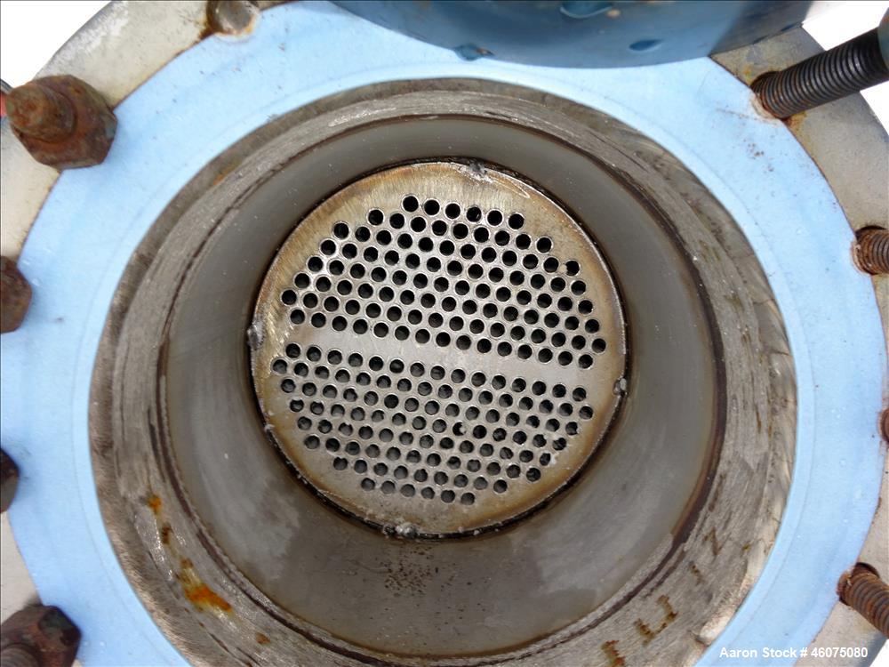 Used ITT Industries Shell & Tube Heat Exchanger, Approximate 124 Square Feet, Horizontal. Carbon steel shell rated 100 psi at -20 to 375 degrees F. (200) 3/8" Diameter x approximate 78" long 316 Stai...
