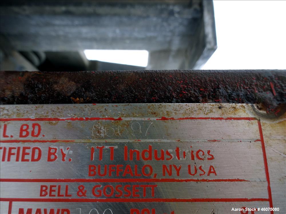 Used ITT Industries Shell & Tube Heat Exchanger, Approximate 124 Square Feet, Horizontal. Carbon steel shell rated 100 psi at -20 to 375 degrees F. (200) 3/8" Diameter x approximate 78" long 316 Stai...