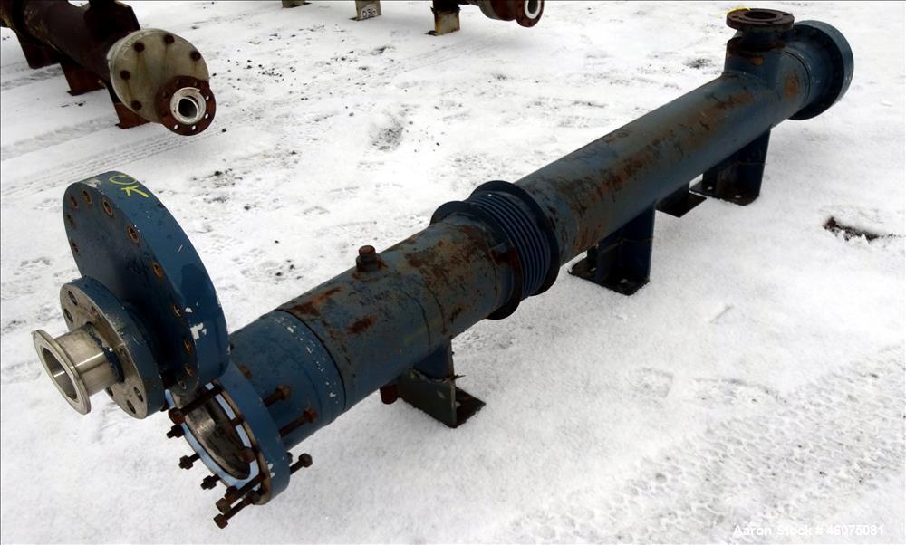 Used ITT Industries Shell & Tube Heat Exchanger, Approximate 124 Square Feet, Horizontal. Carbon steel shell rated 100 psi at -20 to 375 degrees F. (200) 3/8" Diameter x approximate 78" long 316 Stai...