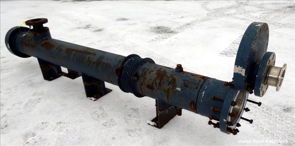 Used ITT Industries Shell & Tube Heat Exchanger, Approximate 124 Square Feet, Horizontal. Carbon steel shell rated 100 psi at -20 to 375 degrees F. (200) 3/8" Diameter x approximate 78" long 316 Stai...