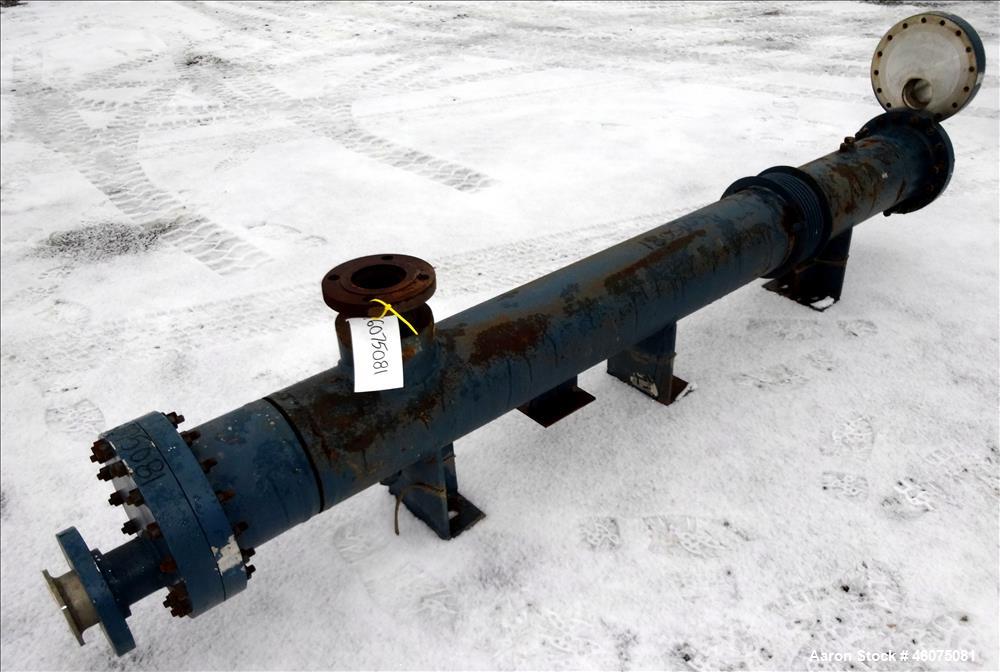 Used ITT Industries Shell & Tube Heat Exchanger, Approximate 124 Square Feet, Horizontal. Carbon steel shell rated 100 psi at -20 to 375 degrees F. (200) 3/8" Diameter x approximate 78" long 316 Stai...