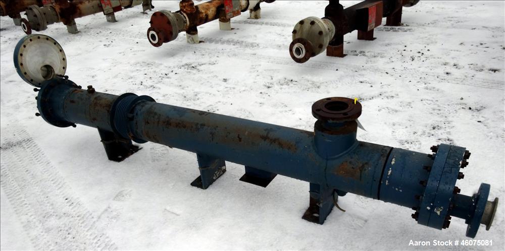 Used ITT Industries Shell & Tube Heat Exchanger, Approximate 124 Square Feet, Horizontal. Carbon steel shell rated 100 psi at -20 to 375 degrees F. (200) 3/8" Diameter x approximate 78" long 316 Stai...