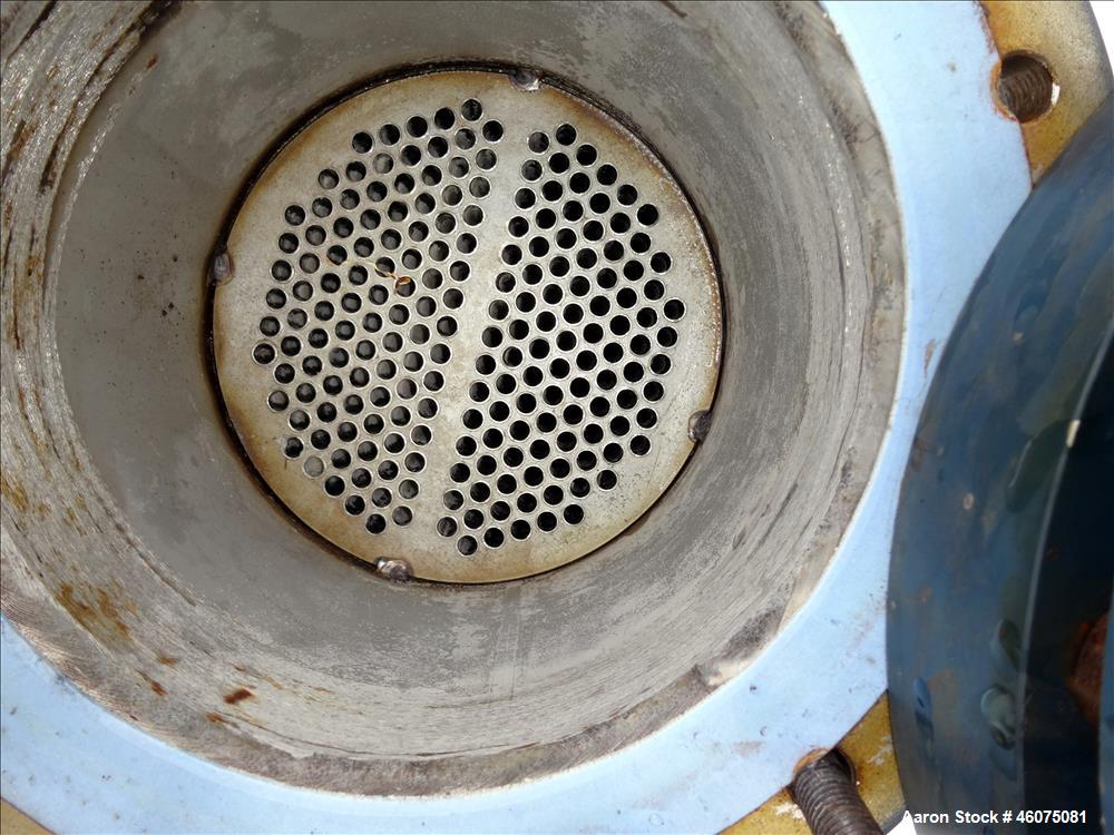 Used ITT Industries Shell & Tube Heat Exchanger, Approximate 124 Square Feet, Horizontal. Carbon steel shell rated 100 psi at -20 to 375 degrees F. (200) 3/8" Diameter x approximate 78" long 316 Stai...