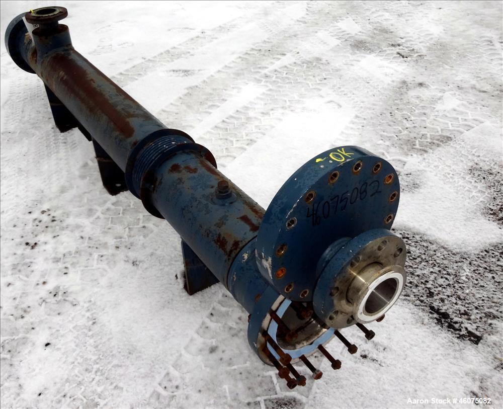 Used ITT Industries Shell & Tube Heat Exchanger, Approximate 124 Square Feet, Horizontal. Carbon steel shell rated 100 psi at -20 to 375 degrees F. (200) 3/8" Diameter x approximate 78" long 316 Stai...