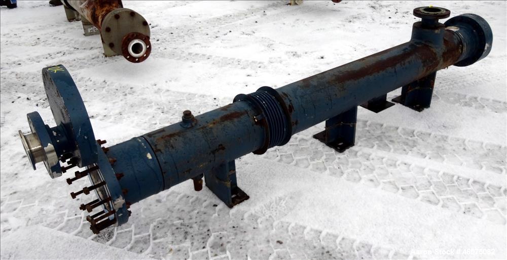 Used ITT Industries Shell & Tube Heat Exchanger, Approximate 124 Square Feet, Horizontal. Carbon steel shell rated 100 psi at -20 to 375 degrees F. (200) 3/8" Diameter x approximate 78" long 316 Stai...