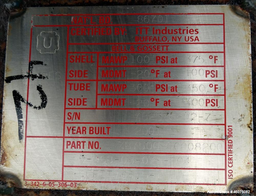 Used ITT Industries Shell & Tube Heat Exchanger, Approximate 124 Square Feet, Horizontal. Carbon steel shell rated 100 psi at -20 to 375 degrees F. (200) 3/8" Diameter x approximate 78" long 316 Stai...