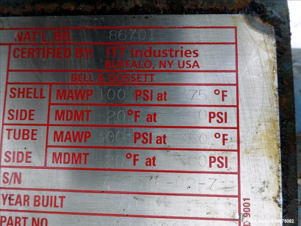 Used ITT Industries Shell & Tube Heat Exchanger, Approximate 124 Square Feet, Horizontal. Carbon steel shell rated 100 psi at -20 to 375 degrees F. (200) 3/8" Diameter x approximate 78" long 316 Stai...