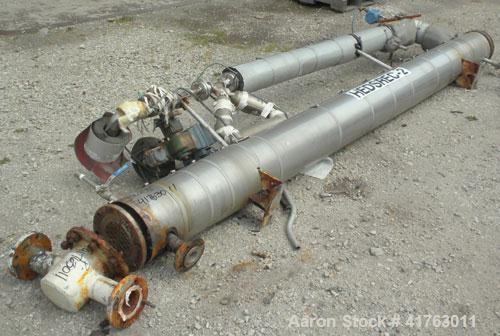 Used J.D. Cousins Two Pass Shell & Tube Heat Exchanger, approximately 61 square feet, horizontal, model FS6144BEM. 316L Stainless steel shell rated 150/FV psi at 300 deg F and –20 deg F at 150/FV psi...