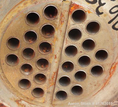 Used J.D. Cousins Two Pass Shell & Tube Heat Exchanger, approximately 61 square feet, horizontal, model FS6144BEM. 316L Stainless steel shell rated 150/FV psi at 300 deg F and –20 deg F at 150/FV psi...