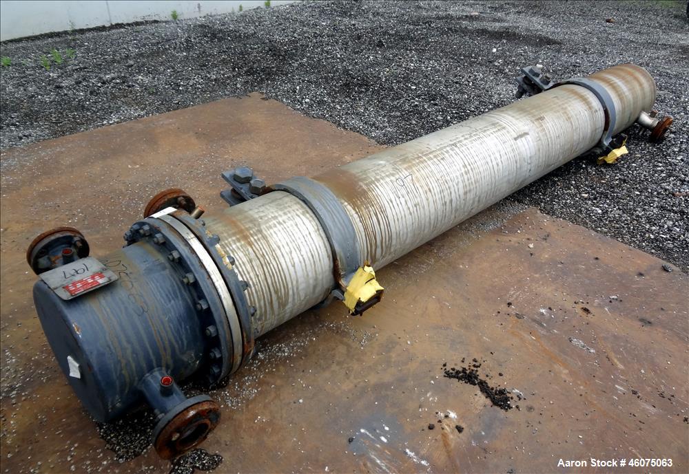 Used J.F.D. Tube & Coil Products U Tube Shell & Tube Heat Exchanger, Approximate 597 Square Feet, Horizontal. 316L Stainless steel shell rated 75 psi at 350 degrees F, (127) 3/4" diameter x 144" long...