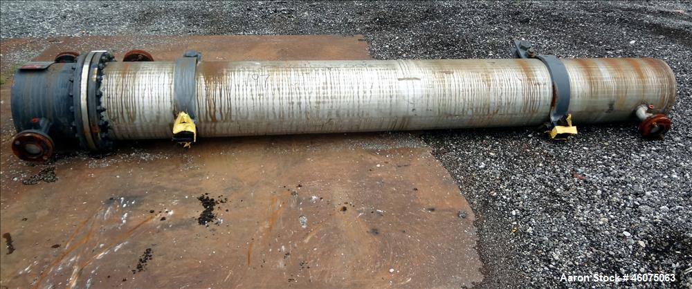 Used J.F.D. Tube & Coil Products U Tube Shell & Tube Heat Exchanger, Approximate 597 Square Feet, Horizontal. 316L Stainless steel shell rated 75 psi at 350 degrees F, (127) 3/4" diameter x 144" long...