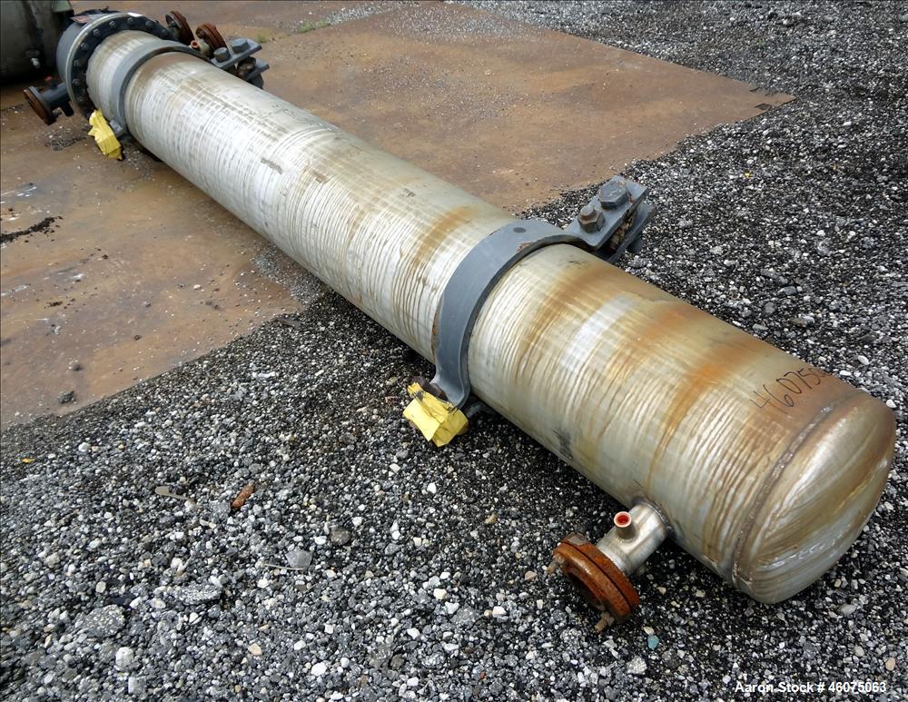 Used J.F.D. Tube & Coil Products U Tube Shell & Tube Heat Exchanger, Approximate 597 Square Feet, Horizontal. 316L Stainless steel shell rated 75 psi at 350 degrees F, (127) 3/4" diameter x 144" long...