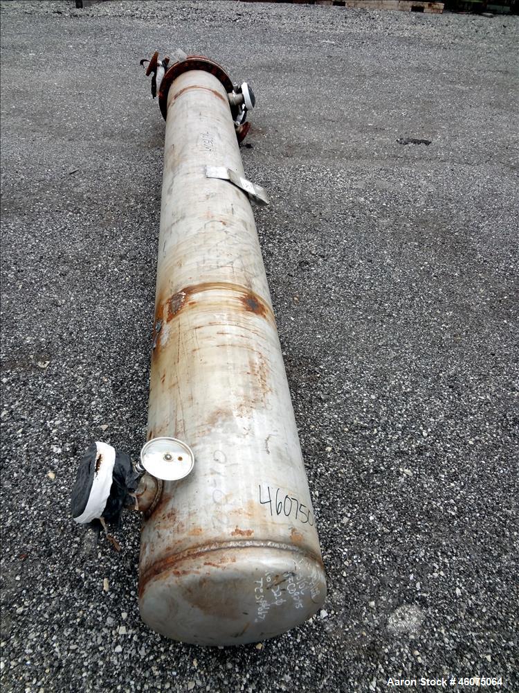Used J.F.D. Tube & Coil Products U Tube Shell & Tube Heat Exchanger, Approximate 597 Square Feet, Horizontal. 316L Stainless steel shell rated 75 psi at 350 degrees F, (127) 3/4" diameter x 144" long...
