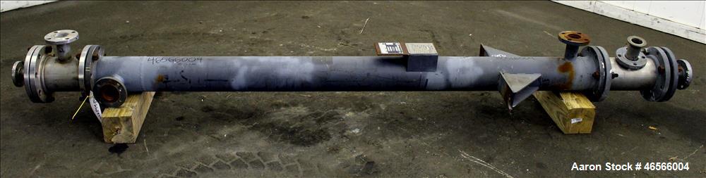 Used Johansing Iron Works Shell & Tube Heat Exchanger, Approximately 37 Square Feet, Vertical. Carbon steel shell rated 150 psi at 170 degrees F. (24) 316L Stainless steel 3/4" diameter x 7'-10-3/8" ...