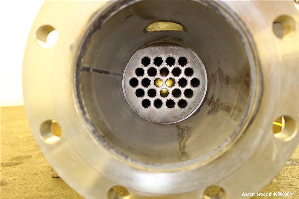 Used Johansing Iron Works Shell & Tube Heat Exchanger, Approximately 37 Square Feet, Vertical. Carbon steel shell rated 150 psi at 170 degrees F. (24) 316L Stainless steel 3/4" diameter x 7'-10-3/8" ...