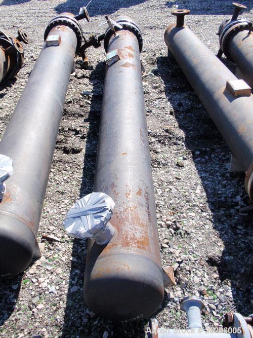 Used Kam Thermal 4 Pass U Tube Heat Exchanger, 194 Square Feet. 304 stainless steel tubes and tube sheets with (104) 3/4" diameter x 9'6" long tubes rated 200 psi at 400 deg F. Carbon steel shell and...