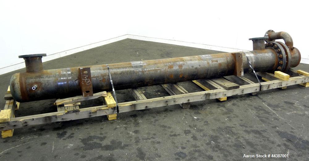Unused- KAM Thermal U-Tube Heat Exchanger, 214 Square Feet, Horizontal. Carbon steel shell rated 300 psi at -20 to 750 degrees F. (52) 3/4" diameter x 10' long 304 stainless steel tubes rated 150 psi...