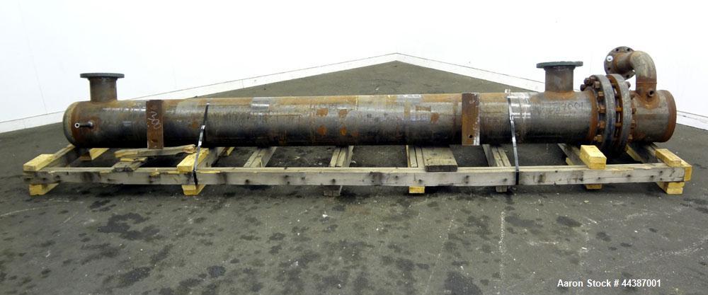 Unused- KAM Thermal U-Tube Heat Exchanger, 214 Square Feet, Horizontal. Carbon steel shell rated 300 psi at -20 to 750 degrees F. (52) 3/4" diameter x 10' long 304 stainless steel tubes rated 150 psi...