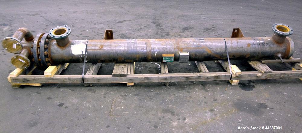 Unused- KAM Thermal U-Tube Heat Exchanger, 214 Square Feet, Horizontal. Carbon steel shell rated 300 psi at -20 to 750 degrees F. (52) 3/4" diameter x 10' long 304 stainless steel tubes rated 150 psi...