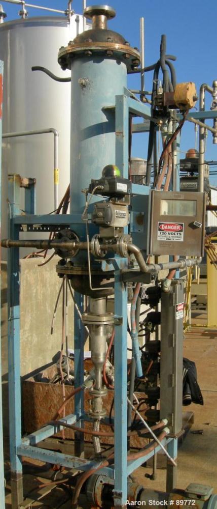 USED: KAM Thermal Equip shell and tube heat exchanger. Vertical, 12" shell x 46" long. 3" opening on heads, 2" on shell. Carbon steel shell, stainless steel tubes and heads. Both sides rated 40 psi @...