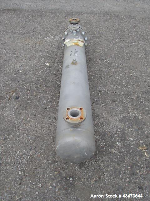 Used Ketema U Tube Heat Exchanger, 170 Square Feet, Model 10-A-60. 316L Stainless steel tubes, tube sheet, bonnet and shell. (72) 0.625" Diameter tubes rated 150 psi at +608/-76 degrees F. Shell rate...