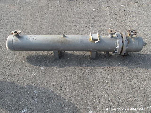 Used Ketema U Tube Heat Exchanger, 170 Square Feet, Model 10-A-60. 316L Stainless steel tubes, tube sheet, bonnet and shell. (72) 0.625" Diameter tubes rated 150 psi at +608/-76 degrees F. Shell rate...
