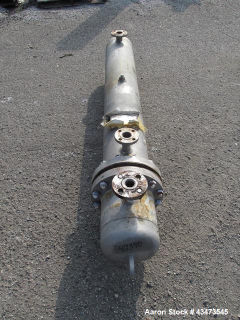Used Ketema U Tube Heat Exchanger, 170 Square Feet, Model 10-A-60. 316L Stainless steel tubes, tube sheet, bonnet and shell. (72) 0.625" Diameter tubes rated 150 psi at +608/-76 degrees F. Shell rate...