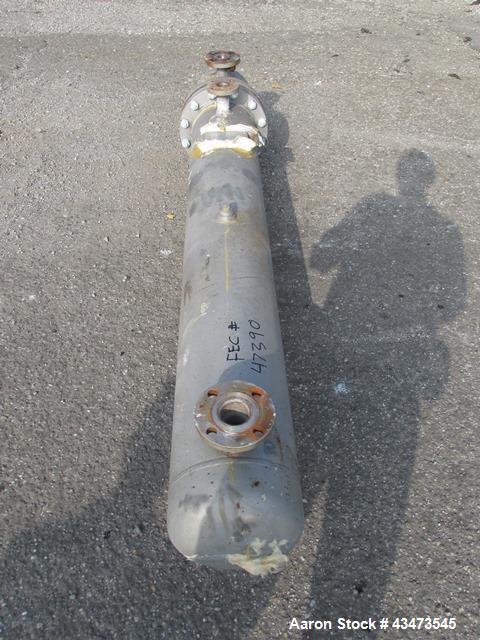 Used Ketema U Tube Heat Exchanger, 170 Square Feet, Model 10-A-60. 316L Stainless steel tubes, tube sheet, bonnet and shell. (72) 0.625" Diameter tubes rated 150 psi at +608/-76 degrees F. Shell rate...
