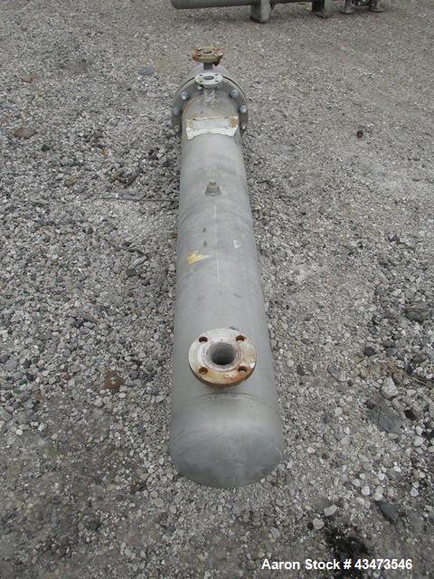 Used Ketema U Tube Heat Exchanger, 170 Square Feet, Model 10-A-60. 316L Stainless steel tubes, tube sheet, bonnet and shell. (72) 0.625" Diameter tubes rated 150 psi at +608/-76 degrees F. Shell rate...