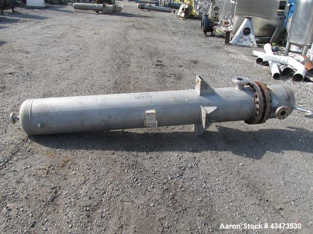 Used Ketema U Tube Heat Exchanger, 239 Square Feet, Model 15-A-96. 316L Stainless steel tubes, tube sheet, bonnet and shell. (72) 0.625" Diameter tubes rated 150 psi at +608/-76 degrees F. Shell rate...