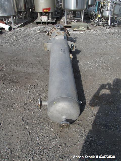 Used Ketema U Tube Heat Exchanger, 239 Square Feet, Model 15-A-96. 316L Stainless steel tubes, tube sheet, bonnet and shell. (72) 0.625" Diameter tubes rated 150 psi at +608/-76 degrees F. Shell rate...
