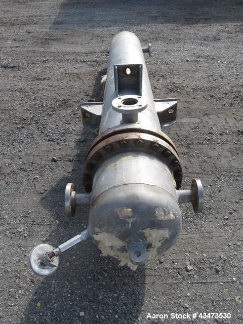 Used Ketema U Tube Heat Exchanger, 239 Square Feet, Model 15-A-96. 316L Stainless steel tubes, tube sheet, bonnet and shell. (72) 0.625" Diameter tubes rated 150 psi at +608/-76 degrees F. Shell rate...