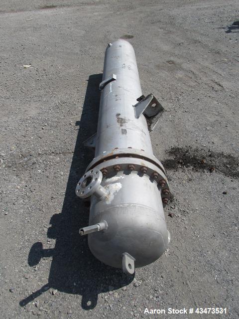 Used Ketema U Tube Heat Exchanger, 239 Square Feet, Model 15-A-96. 316L Stainless steel tubes, tube sheet, bonnet and shell. (72) 0.625" Diameter tubes rated 150 psi at +608/-76 degrees F. Shell rate...