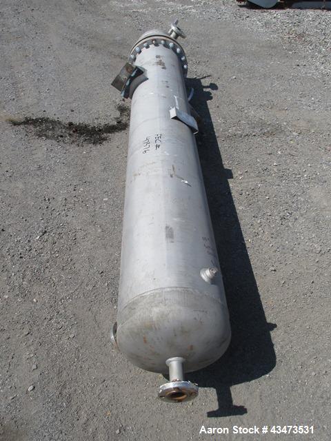Used Ketema U Tube Heat Exchanger, 239 Square Feet, Model 15-A-96. 316L Stainless steel tubes, tube sheet, bonnet and shell. (72) 0.625" Diameter tubes rated 150 psi at +608/-76 degrees F. Shell rate...
