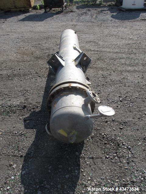 Used Ketema U Tube Heat Exchanger, 239 Square Feet, Model 15-A-96. 316L Stainless steel tubes, tube sheet, bonnet and shell. (72) 0.625" Diameter tubes rated 150 psi at +608/-76 degrees F. Shell rate...