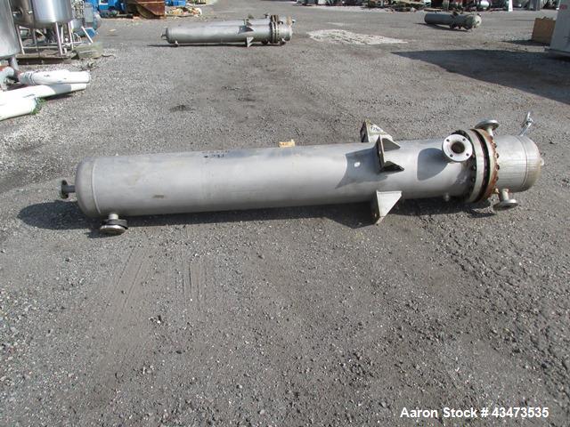 Used Ketema U Tube Heat Exchanger, 239 Square Feet, Model 15-A-96. 316L Stainless steel tubes, tube sheet, bonnet and shell. (72) 0.625" Diameter tubes rated 150 psi at +608/-76 degrees F. Shell rate...