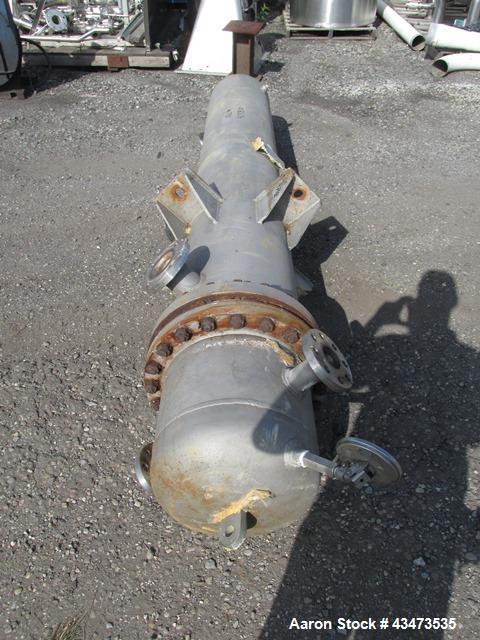 Used Ketema U Tube Heat Exchanger, 239 Square Feet, Model 15-A-96. 316L Stainless steel tubes, tube sheet, bonnet and shell. (72) 0.625" Diameter tubes rated 150 psi at +608/-76 degrees F. Shell rate...