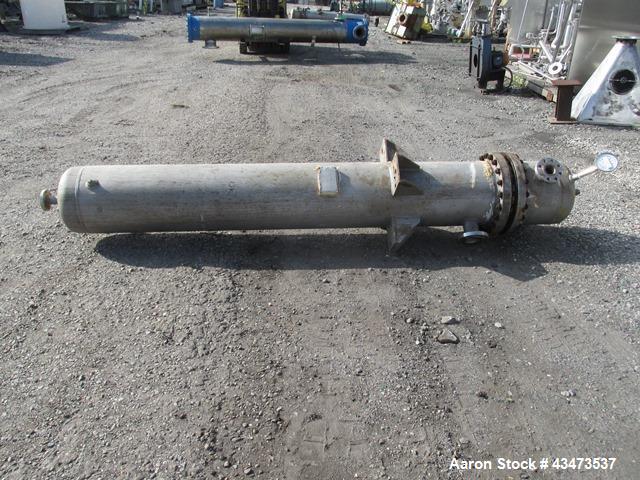 Used Ketema U Tube Heat Exchanger, 239 Square Feet, Model 15-A-96. 316L Stainless steel tubes, tube sheet, bonnet and shell. (72) 0.625" Diameter tubes rated 150 psi at +608/-76 degrees F. Shell rate...