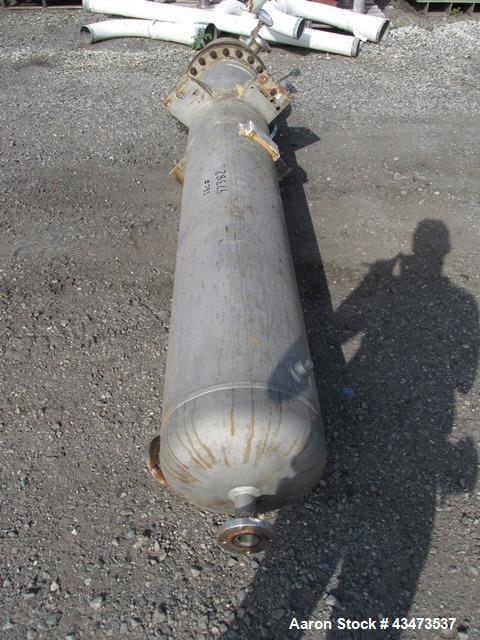 Used Ketema U Tube Heat Exchanger, 239 Square Feet, Model 15-A-96. 316L Stainless steel tubes, tube sheet, bonnet and shell. (72) 0.625" Diameter tubes rated 150 psi at +608/-76 degrees F. Shell rate...