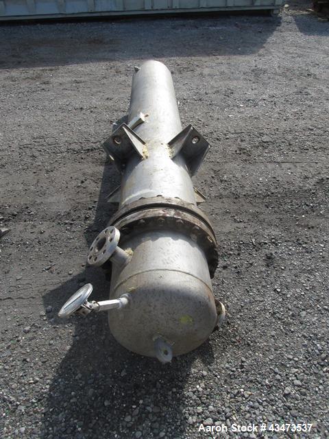 Used Ketema U Tube Heat Exchanger, 239 Square Feet, Model 15-A-96. 316L Stainless steel tubes, tube sheet, bonnet and shell. (72) 0.625" Diameter tubes rated 150 psi at +608/-76 degrees F. Shell rate...