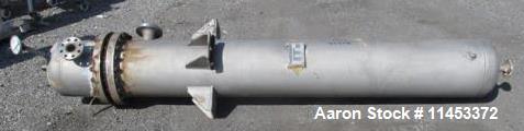 Used- 239 Square Foot Ketema Heat Exchanger. 316L stainless steel tubes, tube sheet, bonnet and shell. U tube design with (7...